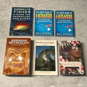 Bundle of Hawai’i books. Fish. Mythology. Plants. Trivia. Moloka’i